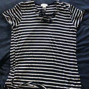 V-neck blue and white top a little bit fancier than the average T-shirt